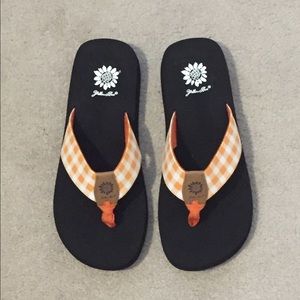 Yellow box flip flops